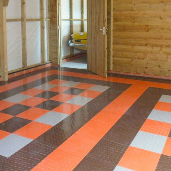 Orange floor installation with Diamond Orange floor tile